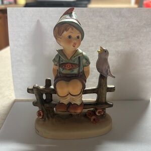Charming Boy and Bird Figurine